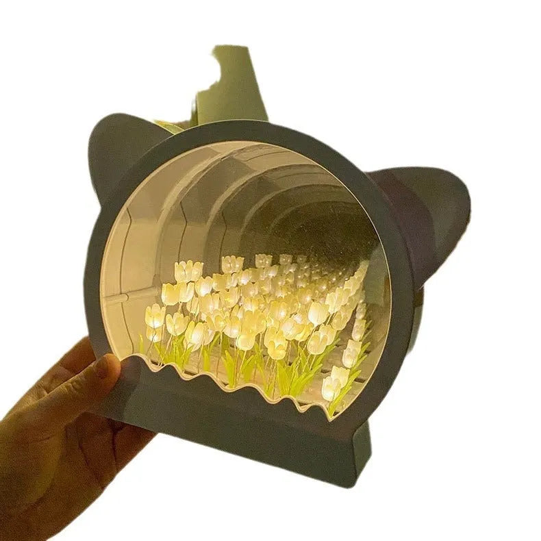 Handmade DIY cat head night lamp with colourful tulip flowers inside silhouette