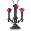 Close-up of a retro-style hollow candlestick pendant necklace with a cross chain, in a gothic design.