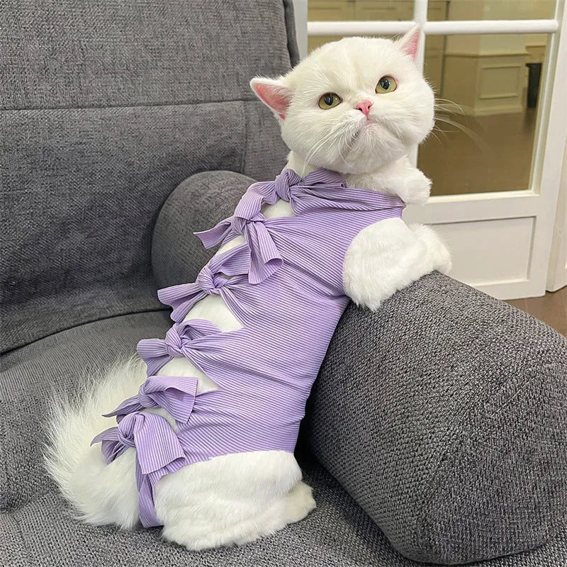 Lace-up polyester cat sterilisation recovery garment shown in blue, brown, green pineapple, pink, or purple