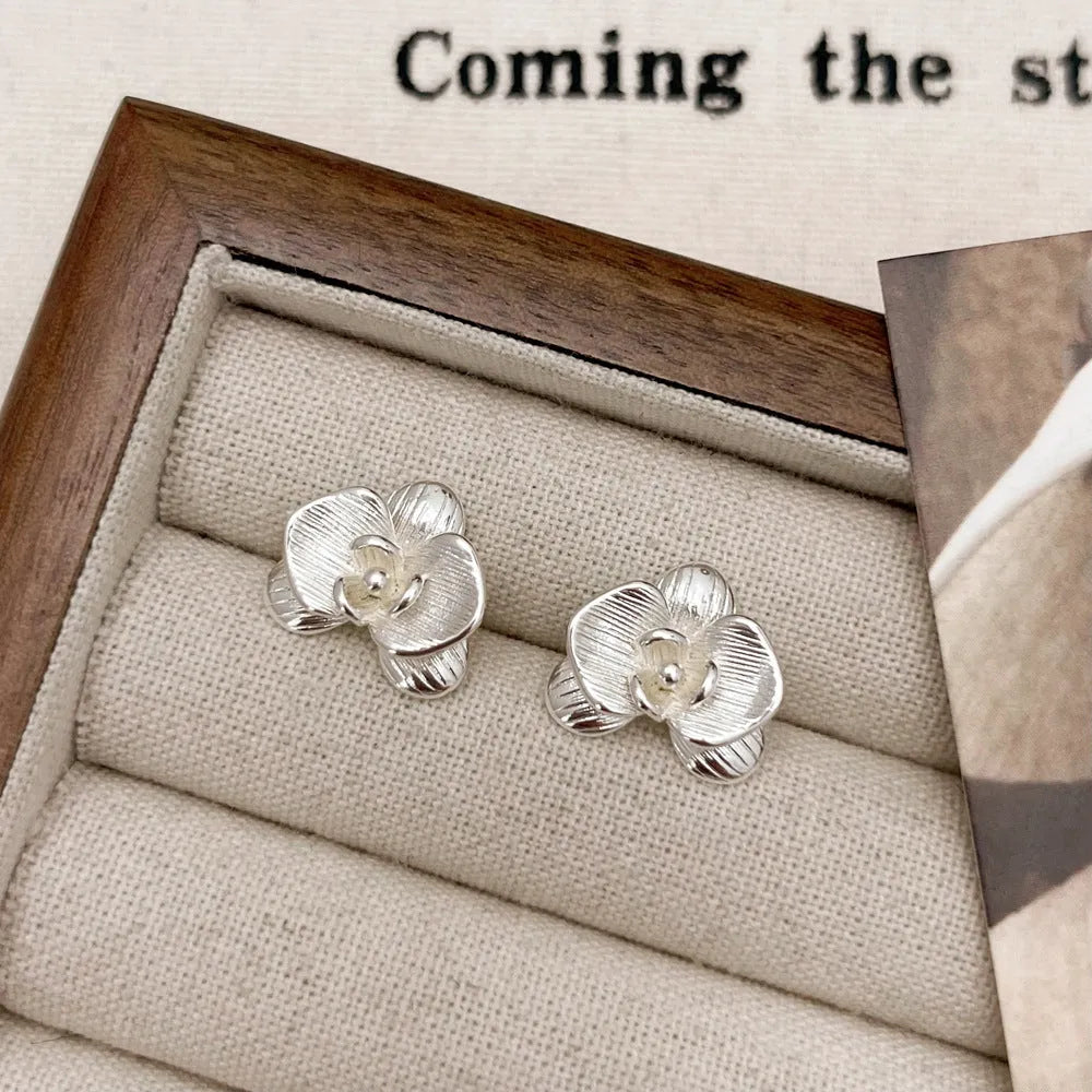 Retro floral copper earrings for women in gold and silver tone options