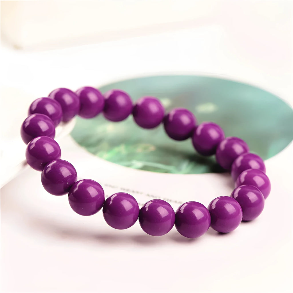 Jiuya purple mica crystal bracelet in 5A grade on a wrist.