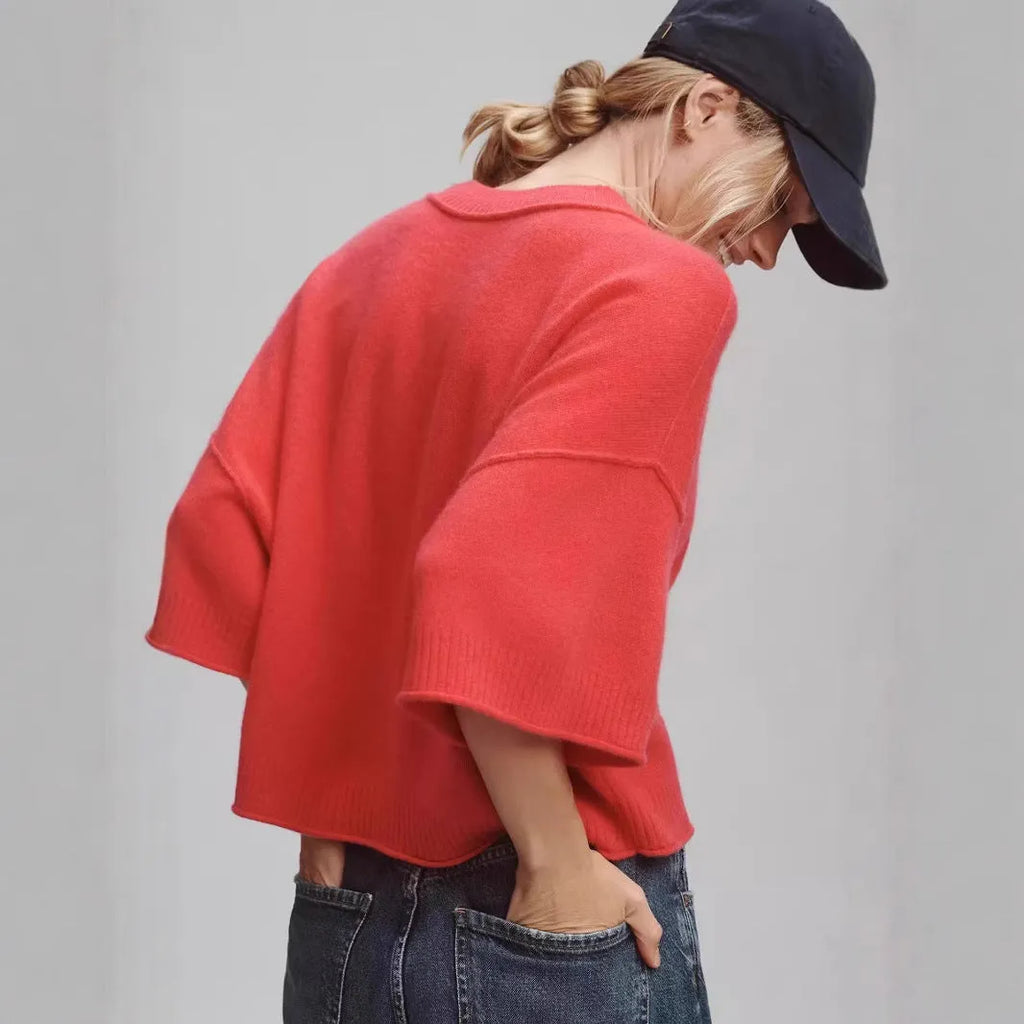Red short viscose T-shirt with exposed navel styling on a mannequin.