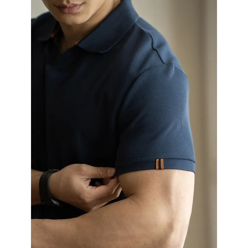 American-style cotton-polyester breathable short-sleeved polo shirt in blue colour showing regular fit and casual styling