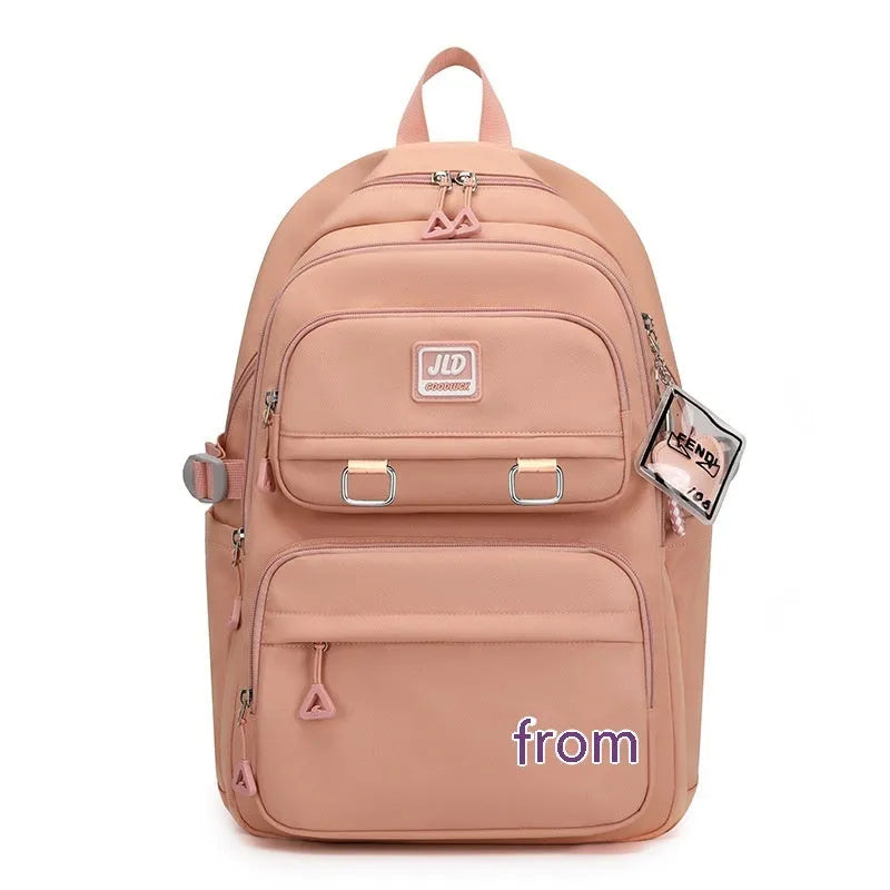 Girls large capacity nylon school backpack in purple with waterproof anti-theft features and breathable back panel