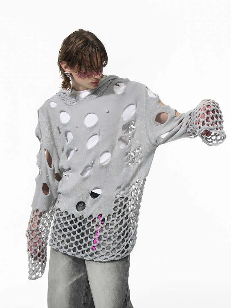 Black men's loose fit hoodie with pearl decorations on the hood, showing thin hollow knit construction.