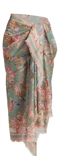 Women's creamy white floral print bikini set with matching skirt for swimming
