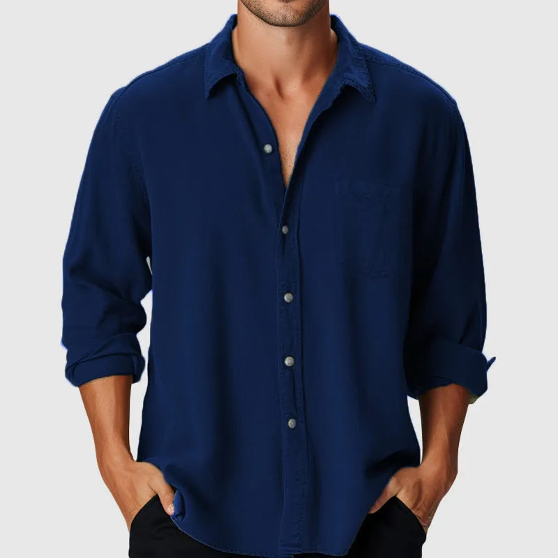 Man wearing a loose-fit, long-sleeve polyester beach shirt with a stand collar