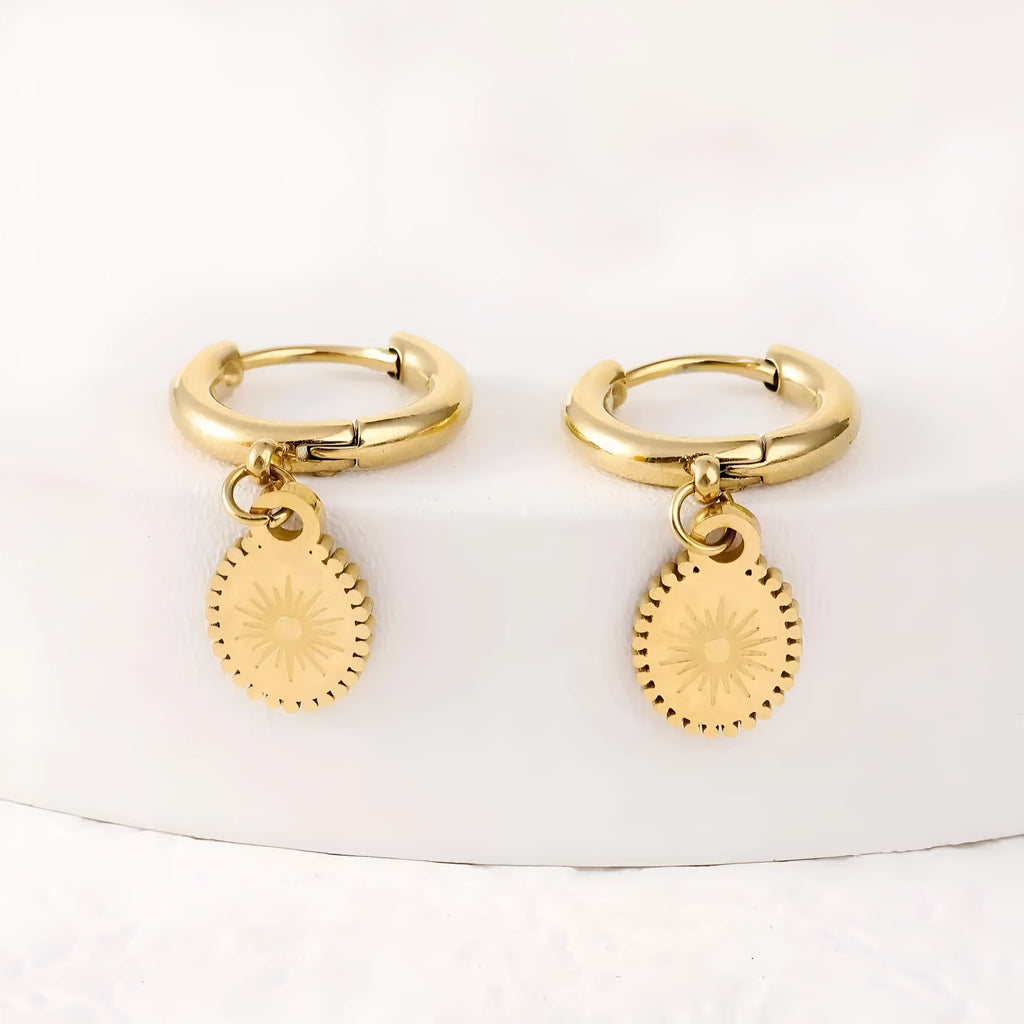 A pair of stainless steel geometric button earrings with ellipse detail, colour XY-EH005.