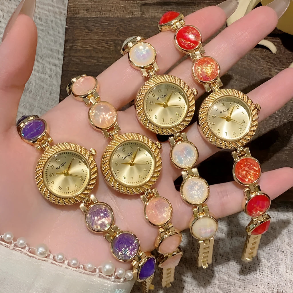 Women's 25mm round quartz watch in zinc alloy case showing six colour options
