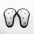Rubber genital protector for adult and child sports safety in hockey, rugby, and martial arts.
