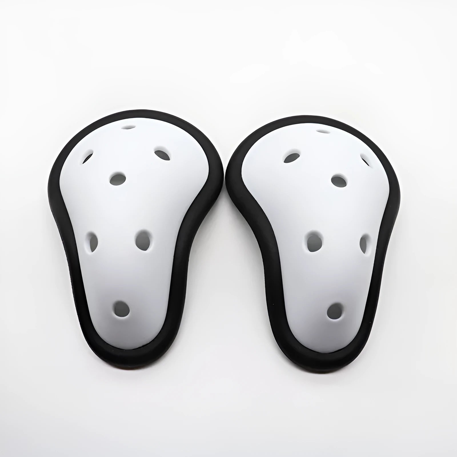 Rubber genital protector for adult and child sports safety in hockey, rugby, and martial arts.