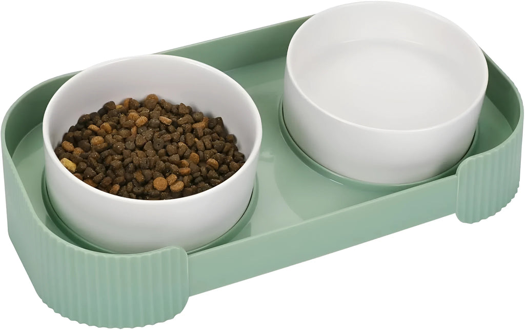 Green ceramic raised cat bowls with 15 degree tilt and non-slip base for spill-proof feeding