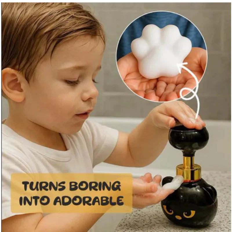 Black plastic cartoon cat foam soap dispenser measuring 10cm by 18cm