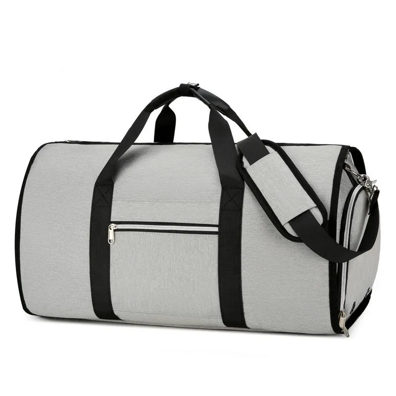 Grey expandable Oxford cloth sports and travel bag with compartments.