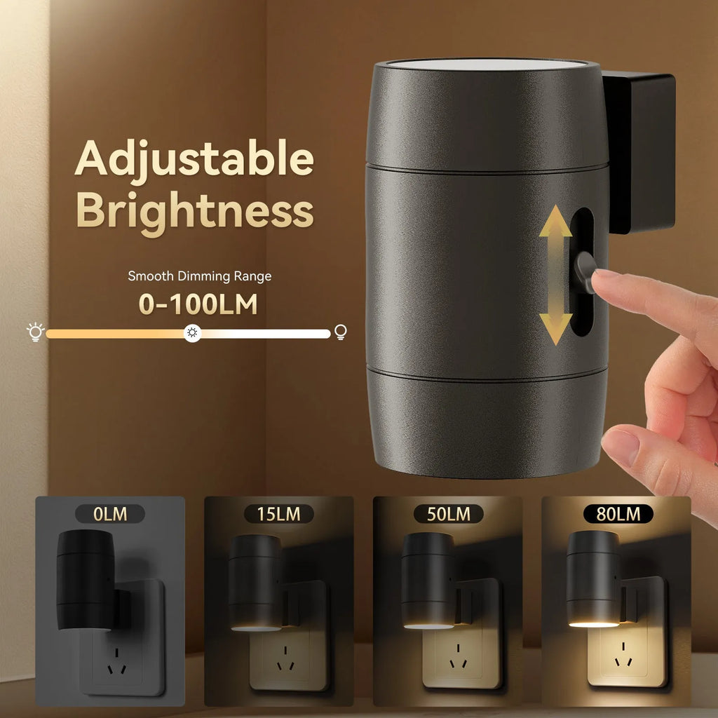 Small white induction night lamp plugged into a wall socket with a rotatable head.