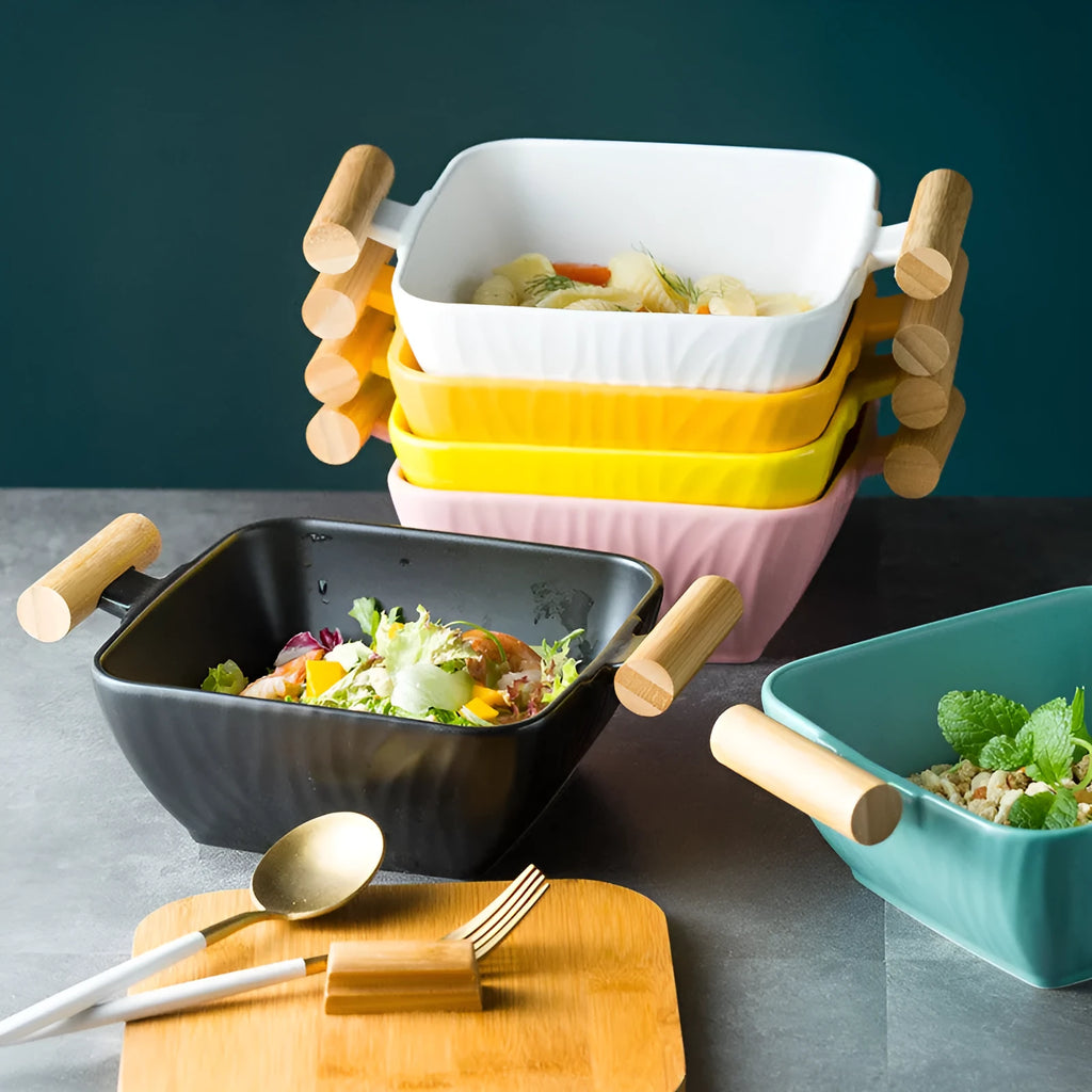 Porcelain ceramic bowl with irregular shape and matching lid in modern design