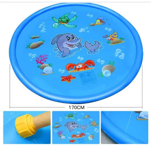 Blue PVC children's water spray mat with marine animal designs laid on grass, connected to a garden hose.