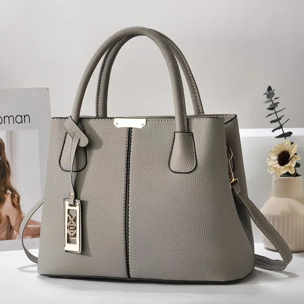 Soft PU women's shoulder bag in horizontal square shape with leather strap, available in multiple colours