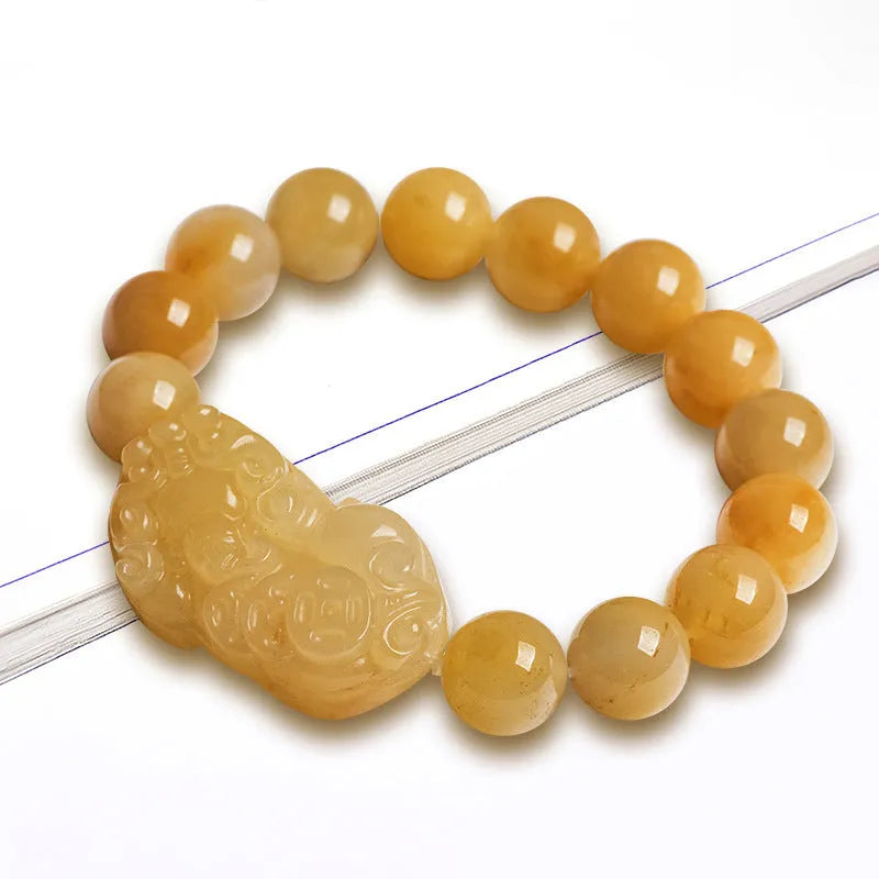 Hand-carved Jinsi Jade money bracelet showing golden thread patterns, displayed in large and small size options.