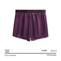 Solid colour men's boxer briefs on a mid-waist model, showing polyester knit fabric in black, blue, red, silver, purple and brown.