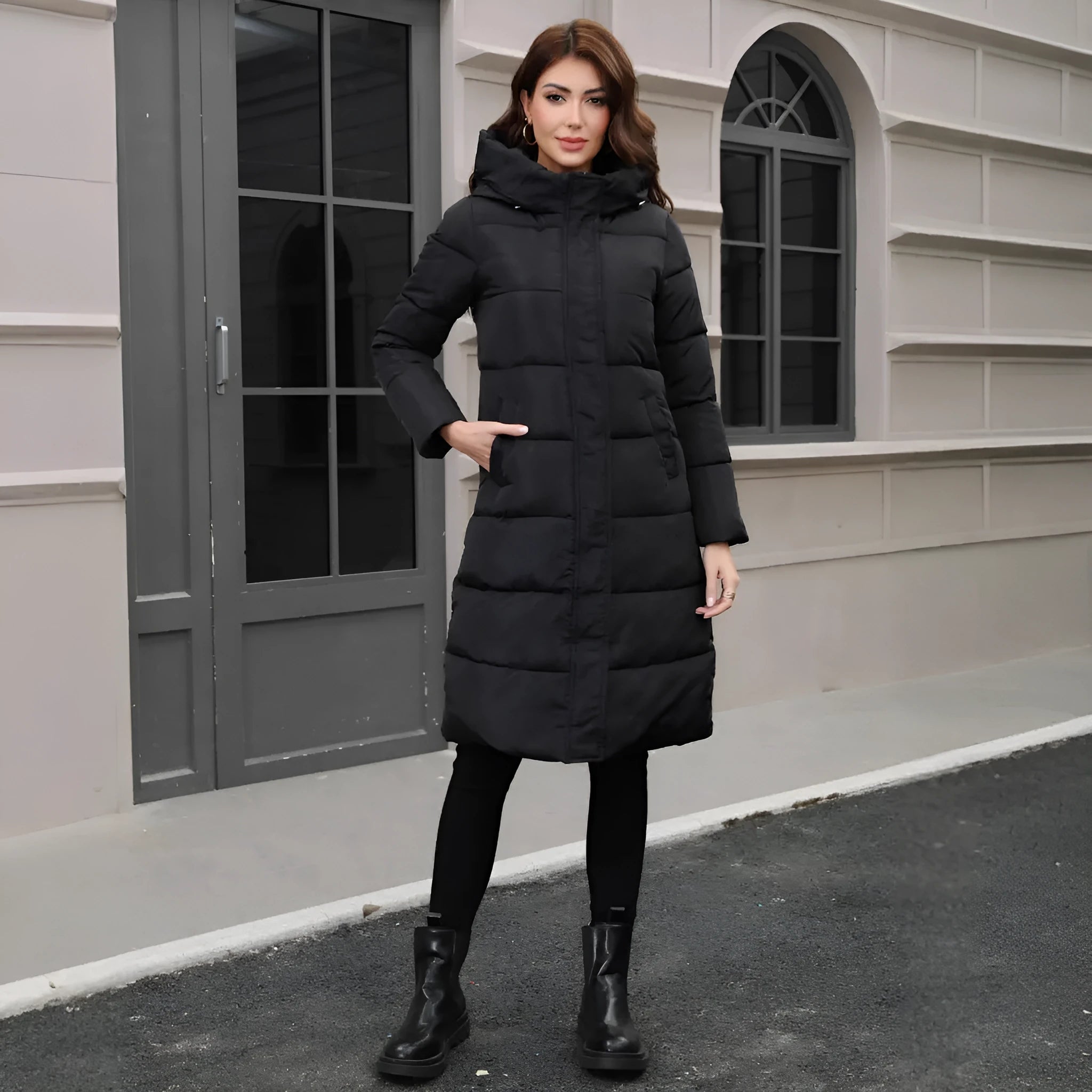 Black hooded slim fit cotton jacket with long sleeves on mannequin