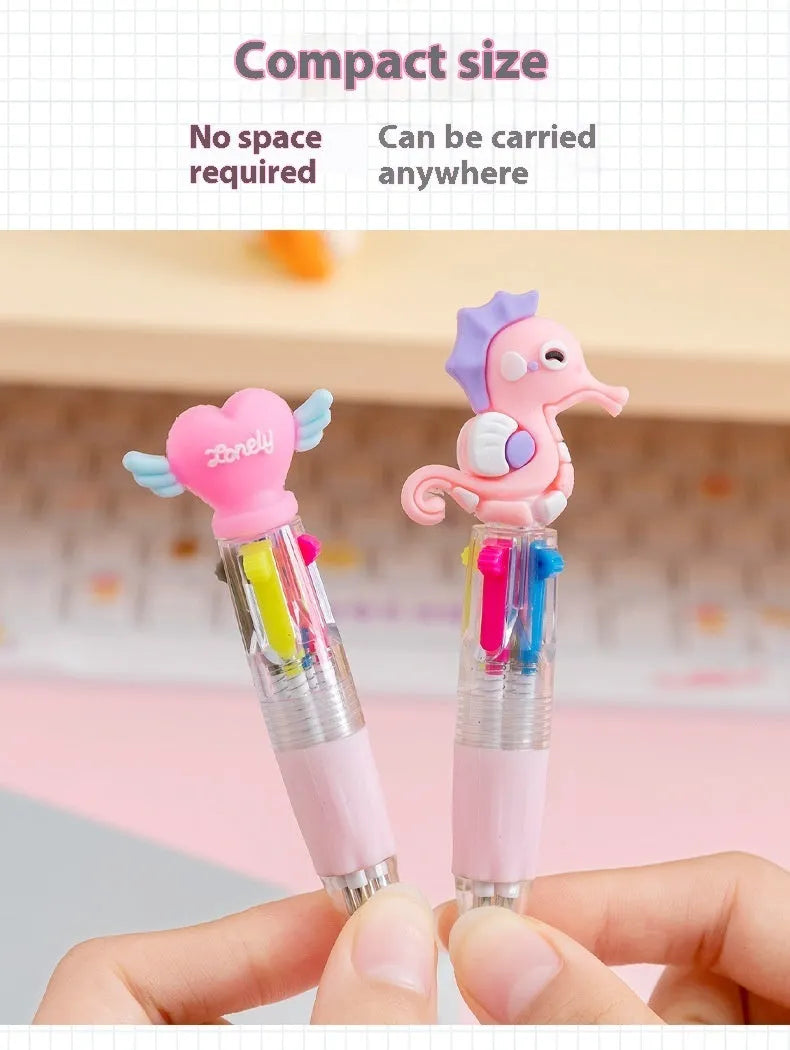 A four-colour ballpoint pen with a press top and a colourful cartoon silicone grip, showing one of five random designs.