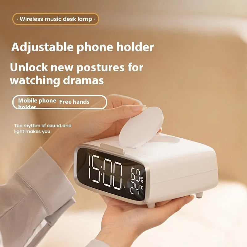 White wireless charger Bluetooth speaker with night light showing charging surface and control buttons