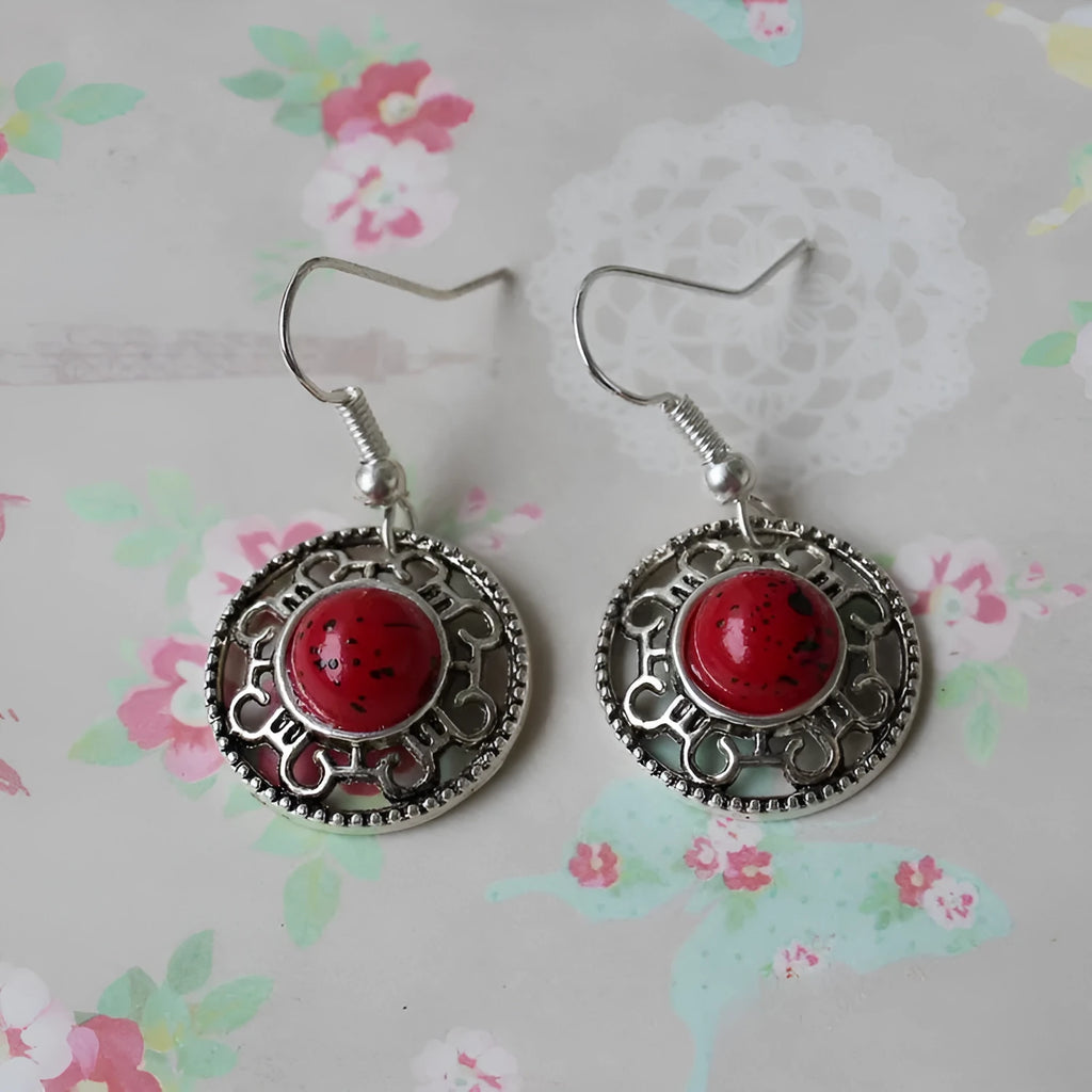 Miao ethnic silver and turquoise earrings with geometric flower disk design and auspicious patterns
