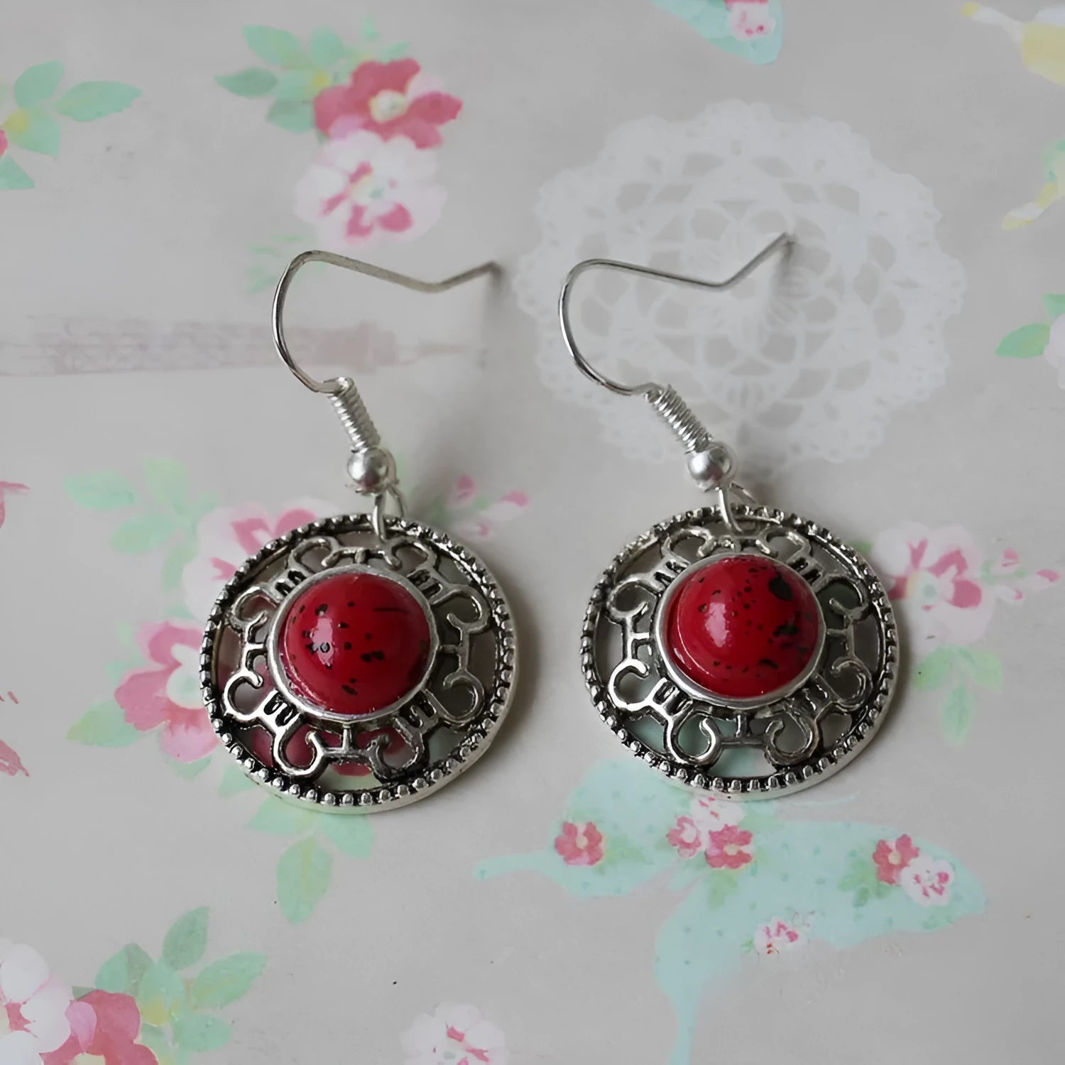 Miao ethnic silver and turquoise earrings with geometric flower disk design and auspicious patterns