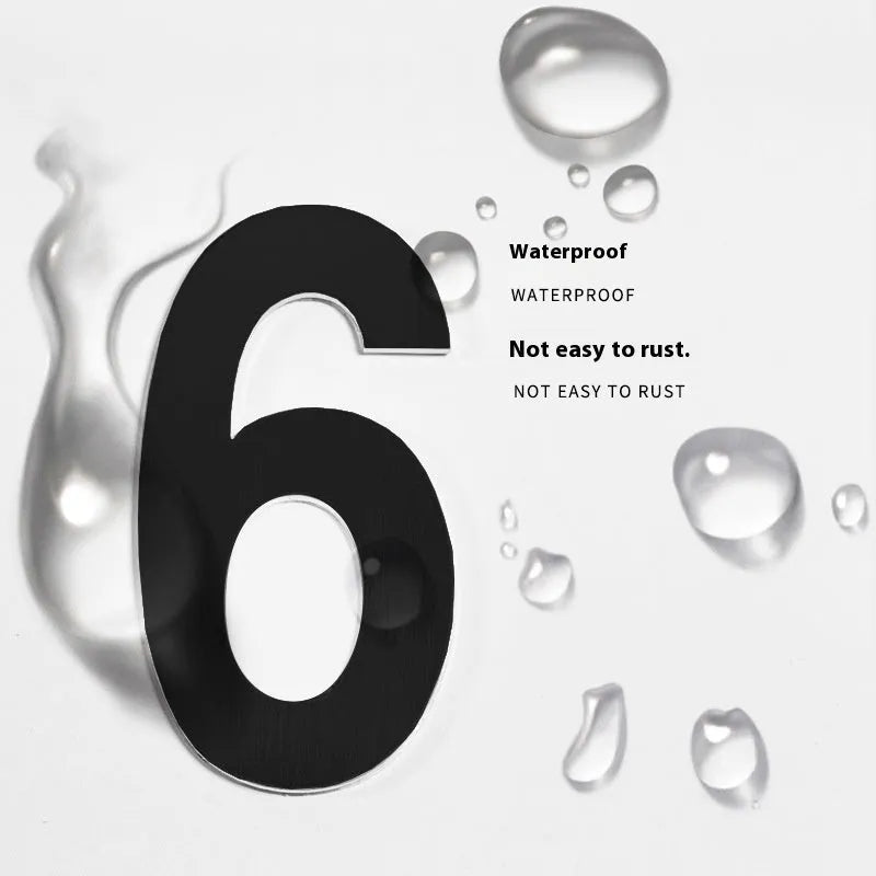 Black stainless steel adhesive house numbers and letters, each 7.5cm high, arranged on a white background.
