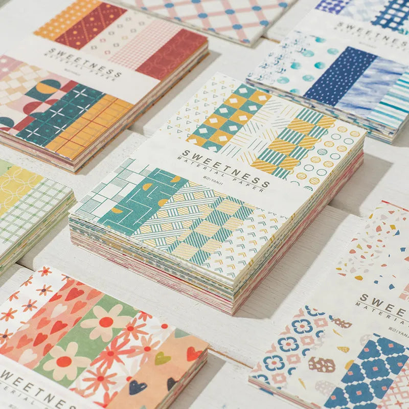 Retro collage note paper in ten pastel colours, each sheet 56mm by 83mm.