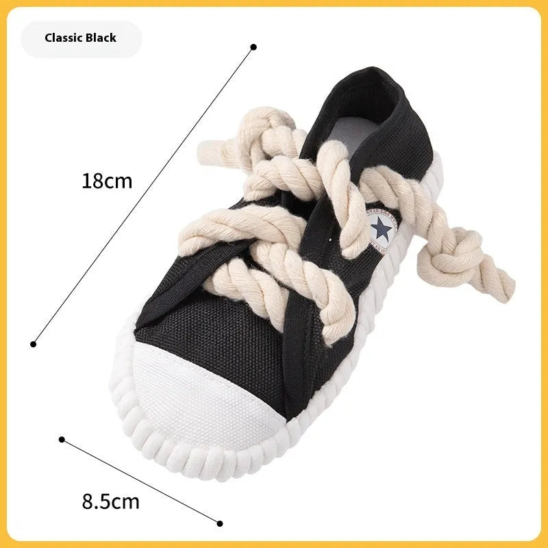 Plastic slipper-shaped dog chew toy in yellow colour for teething relief