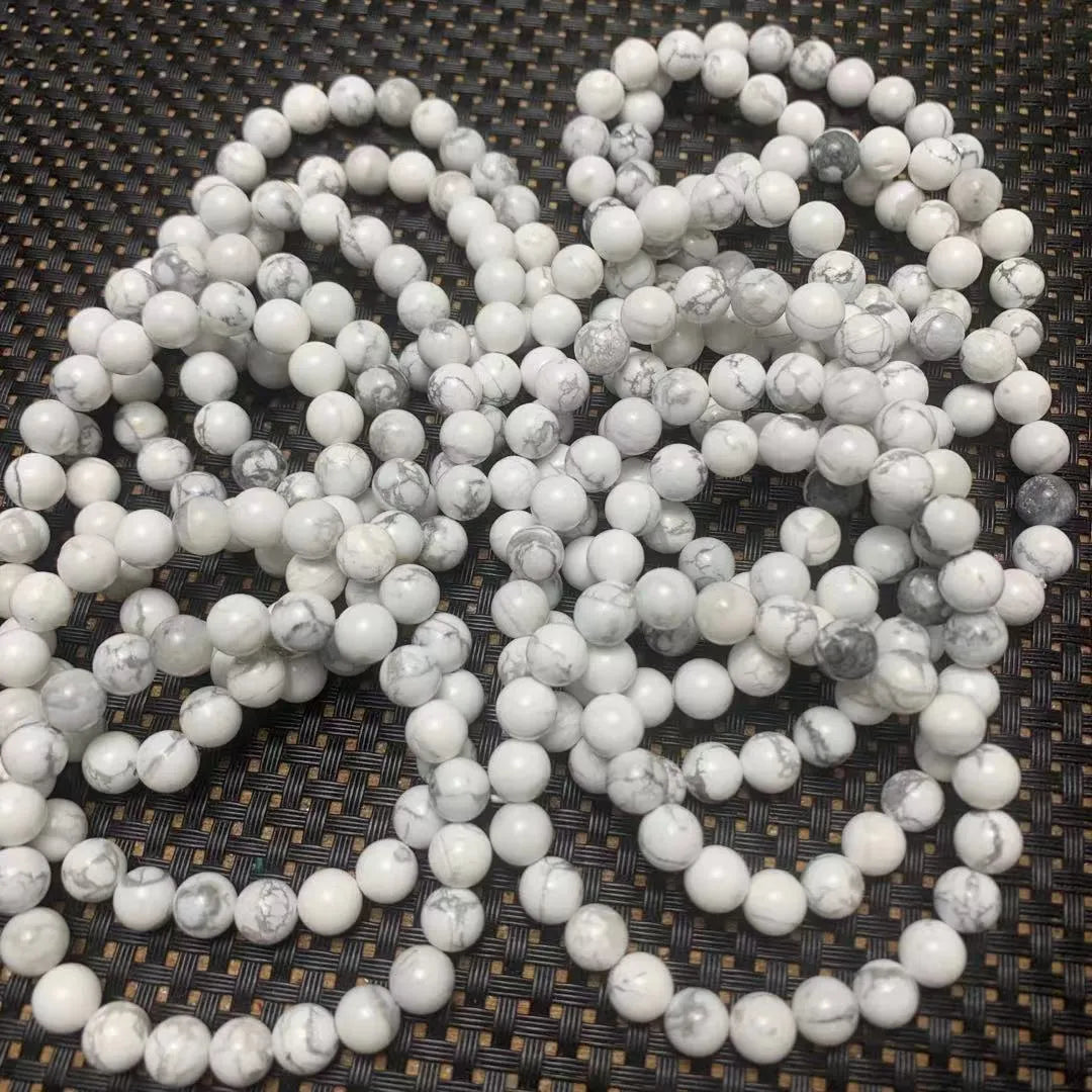 Natural white turquoise single circle bracelet with 8mm beads on a white background