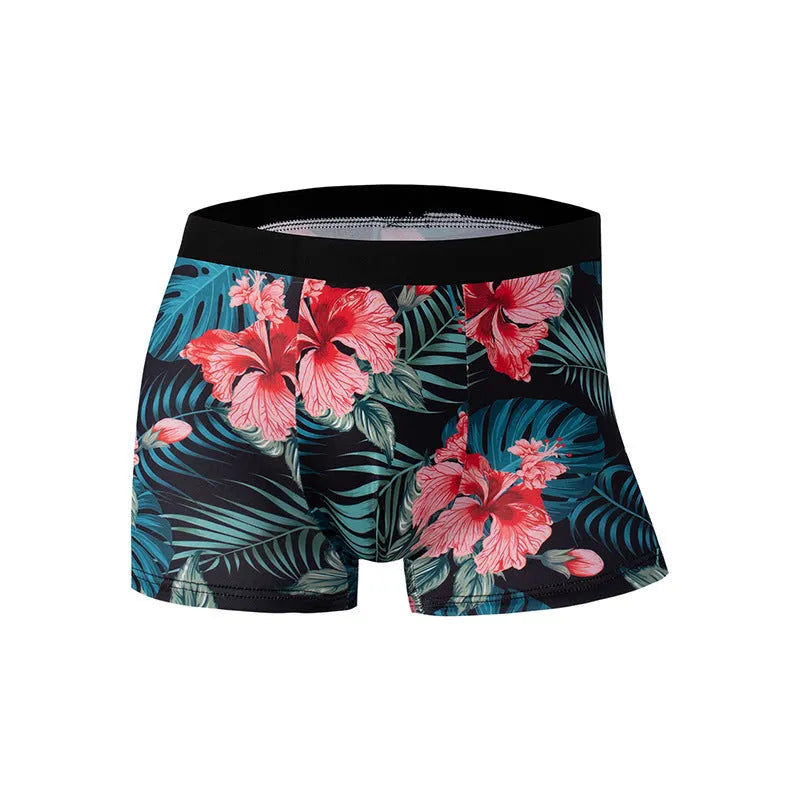 Men's light grey printed polyester underwear laid flat, showing mid waist design.