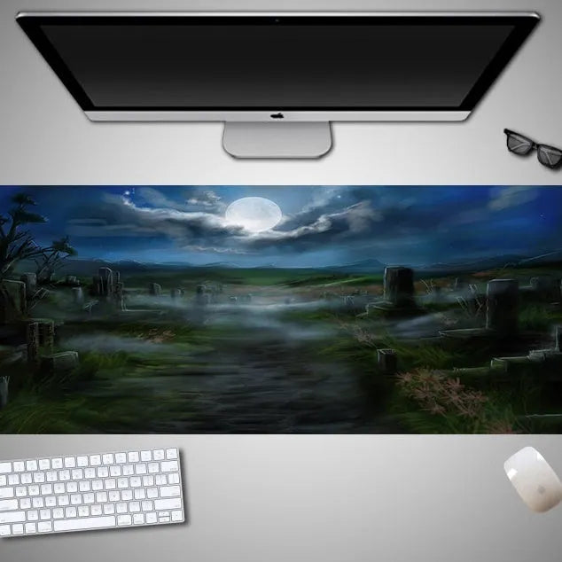 Oversized Halloween-themed computer mouse pad with non-slip rubber cloth base on a desk