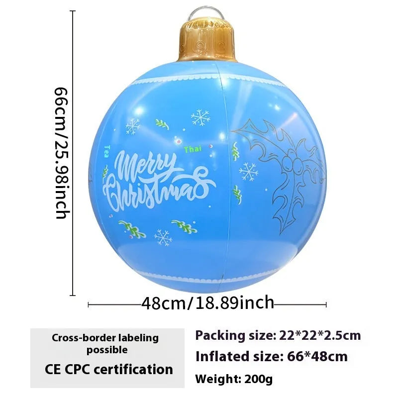 Large inflatable Christmas ball decoration with LED lights in garden setting