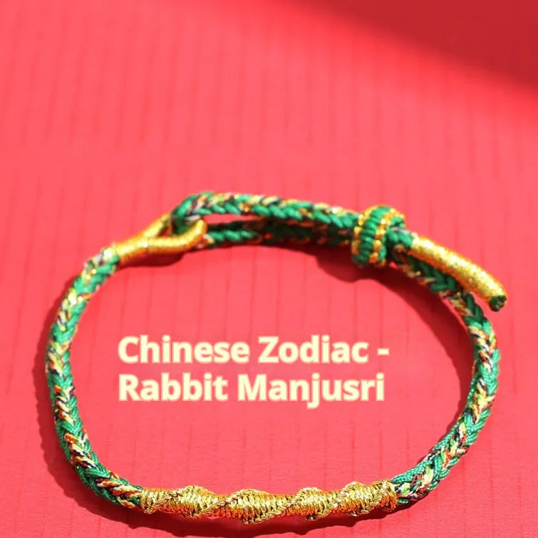 Adjustable eight-strand woven hand strap in zodiac colour theme with traditional pattern