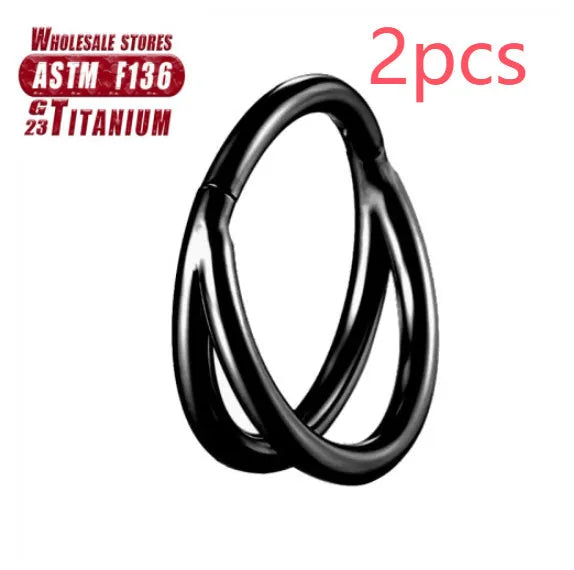 Close-up of a titanium alloy fork nose ring in silver, showing the two-prong design on a grey background.