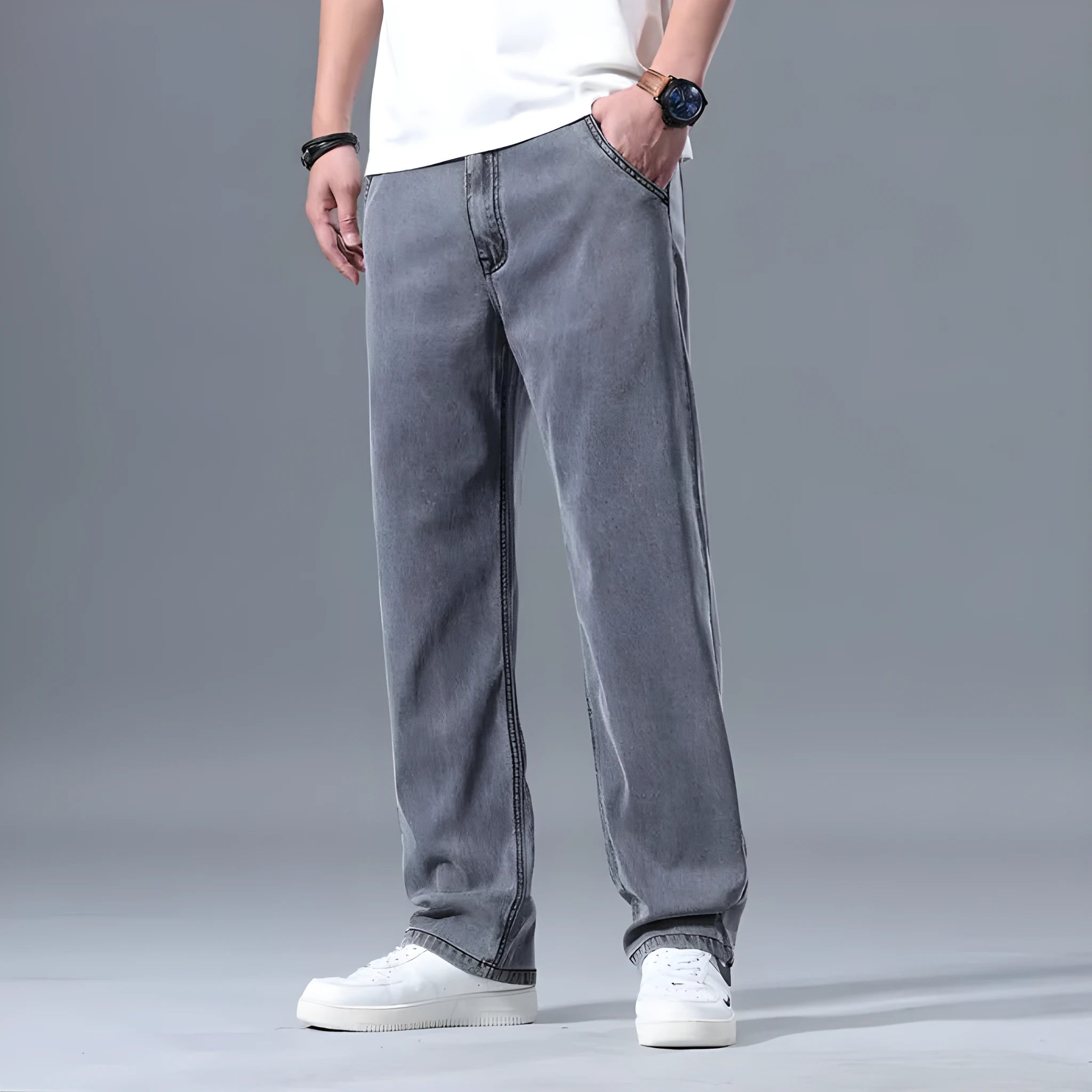 Men's loose straight-leg lyocell jeans in light blue with zipper fly closure