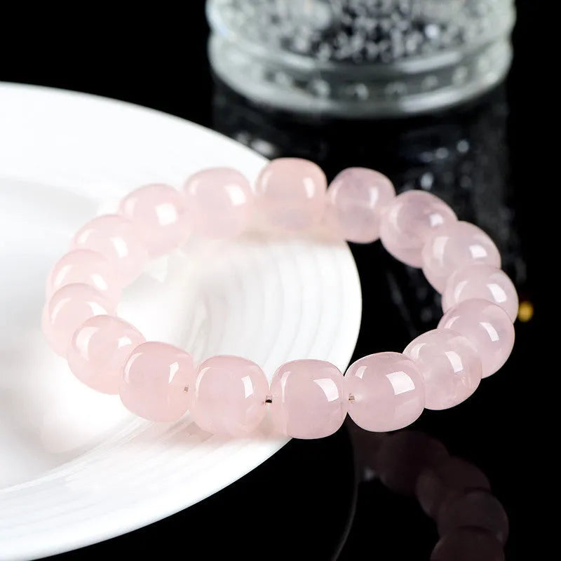 Pink bamboo crystal barrel bead bracelet with 11-12mm geometric design