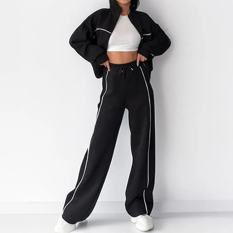 Casual polyester suit set showing a mock neck zip hoodie and matching striped trousers with lace-up detail.