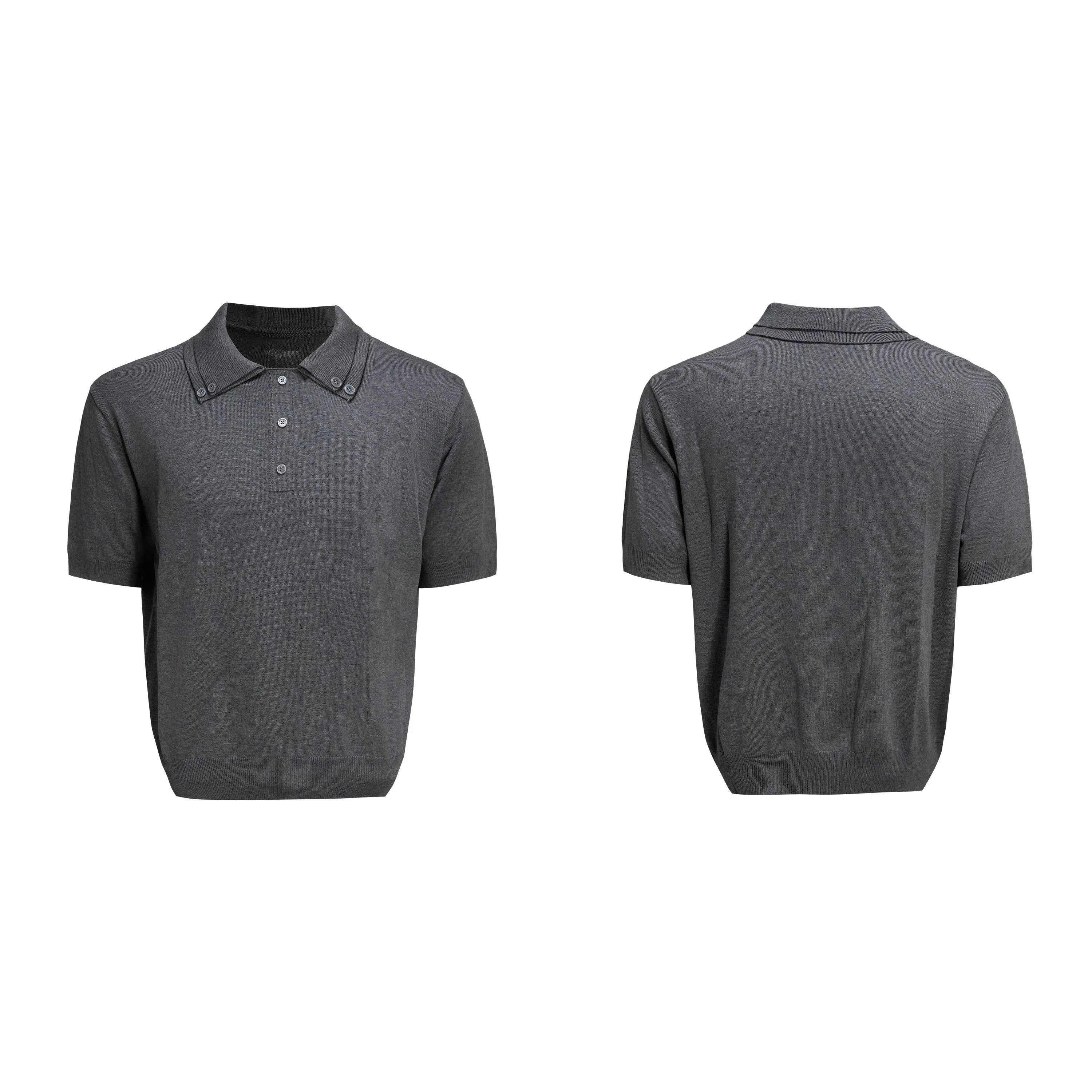 Man wearing a grey loose fit short sleeve shirt with a double collar lapel design.