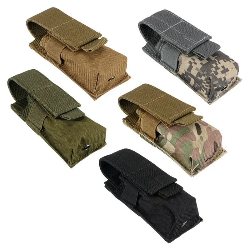 Black tactical MOLLE pistol magazine pouch with elastic cord closure, shown on a vest.