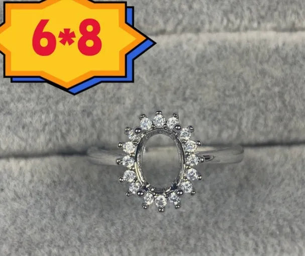 Copper oval denier ring with a 6x8 mm five-pointed star and open mouth setting.
