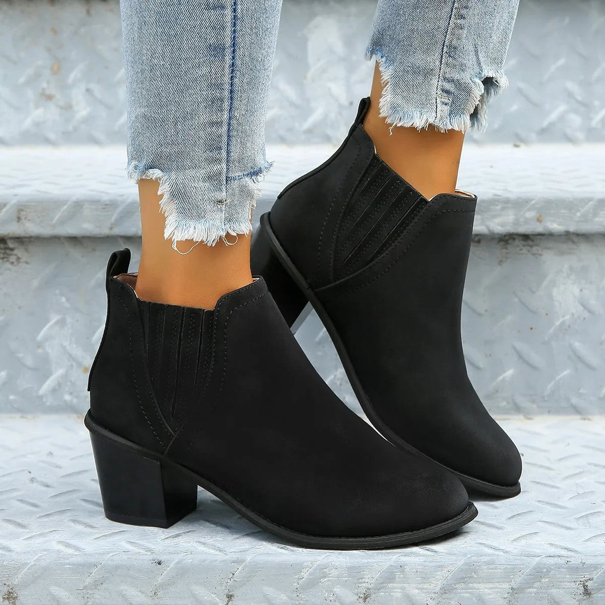 Women's black ankle boots with pointed toe and thick square slip-on heel