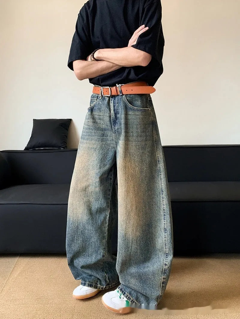 Men's retro blue distressed slim-fit wide-leg jeans on a model