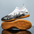 Low-top football trainers with detachable spike studs in black and yellow colourway.
