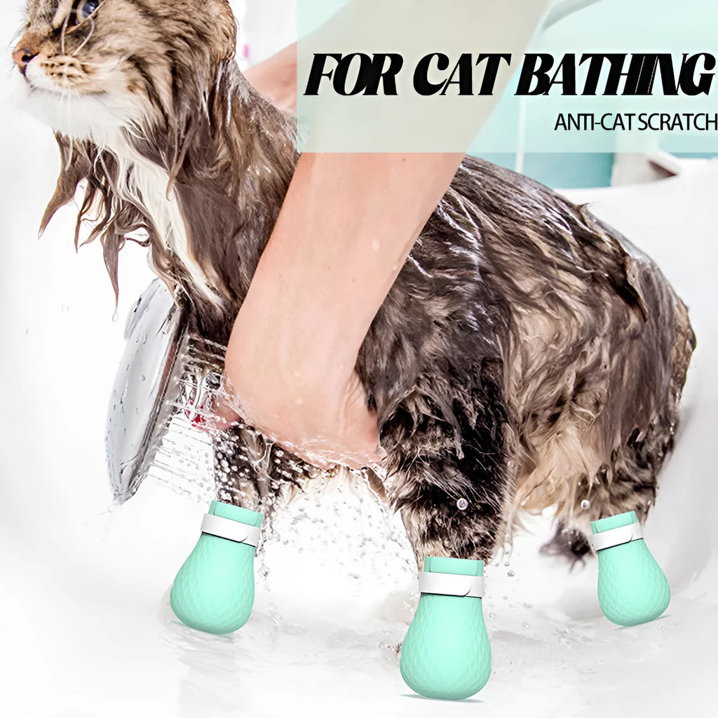 Four green silicone anti-scratch gloves designed to cover a cat's paws.