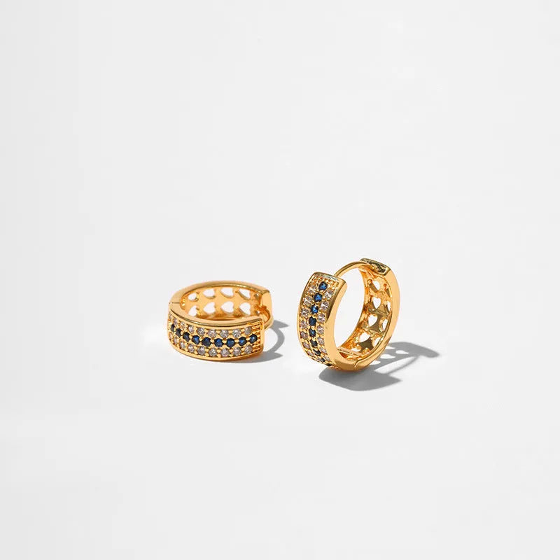 Women's geometric round earrings with gold plating on copper construction
