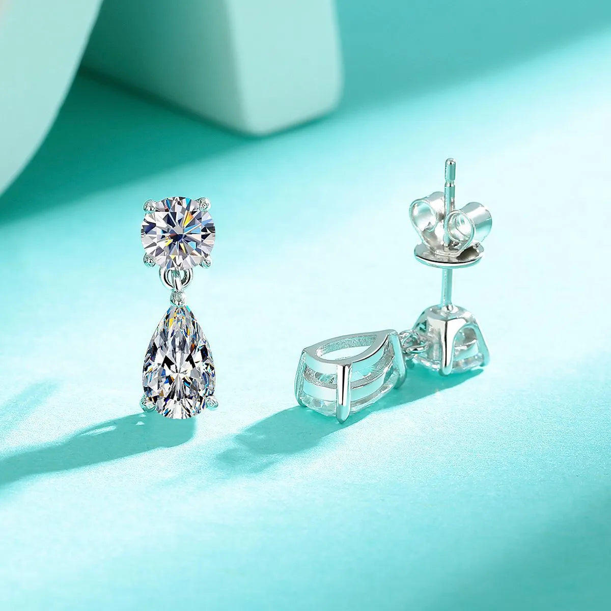 Sterling silver moissanite stud earrings with round and water drop stones